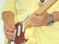 Paul Cotton on guitar